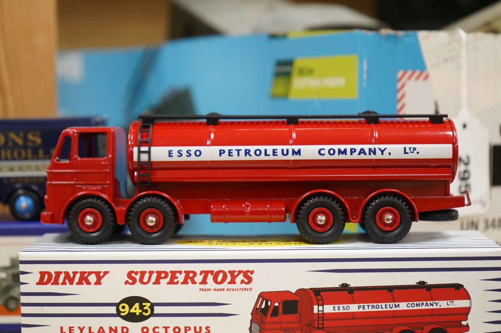 Twenty-two boxed Atlas Dinky Toys, including cars and commercial vehicles, Leyland tankers, a Foden wagon, sports cars, etc.